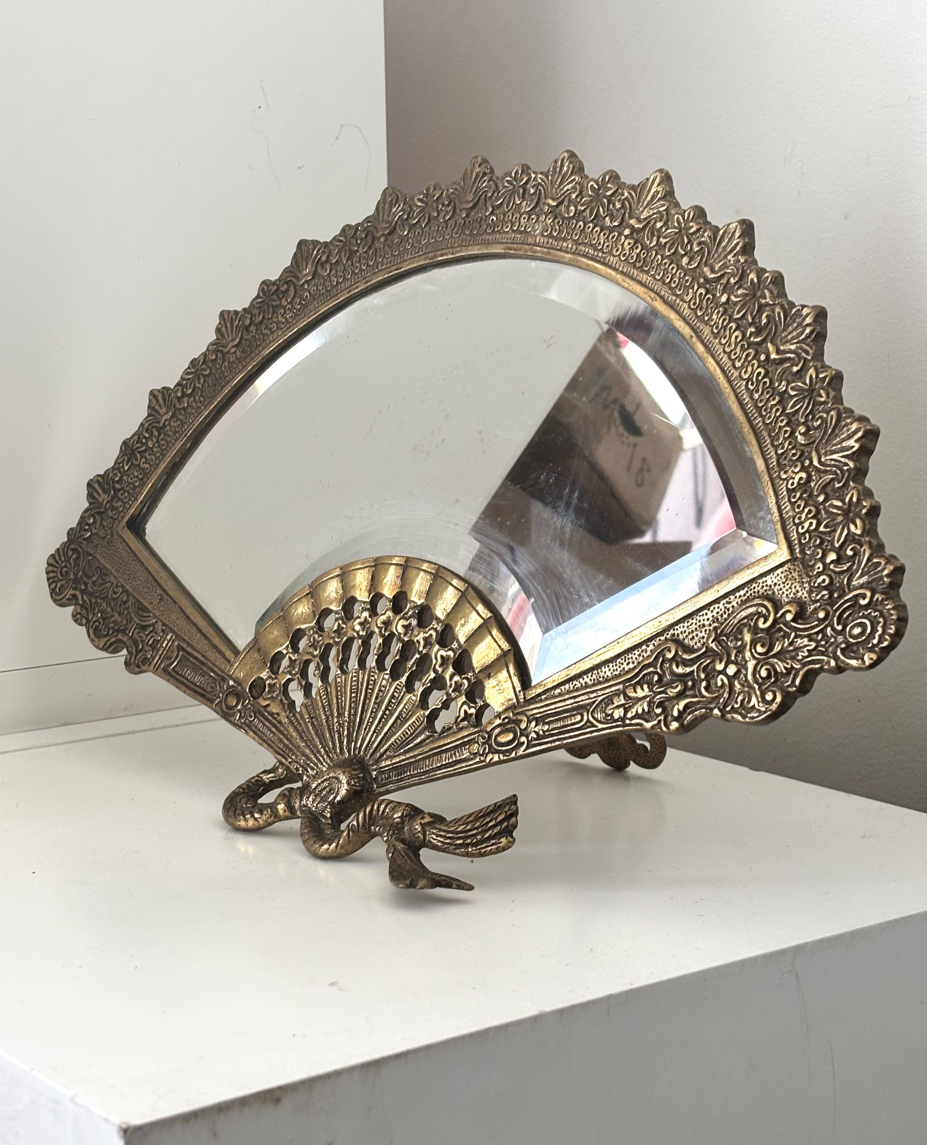 Antique brass mirror