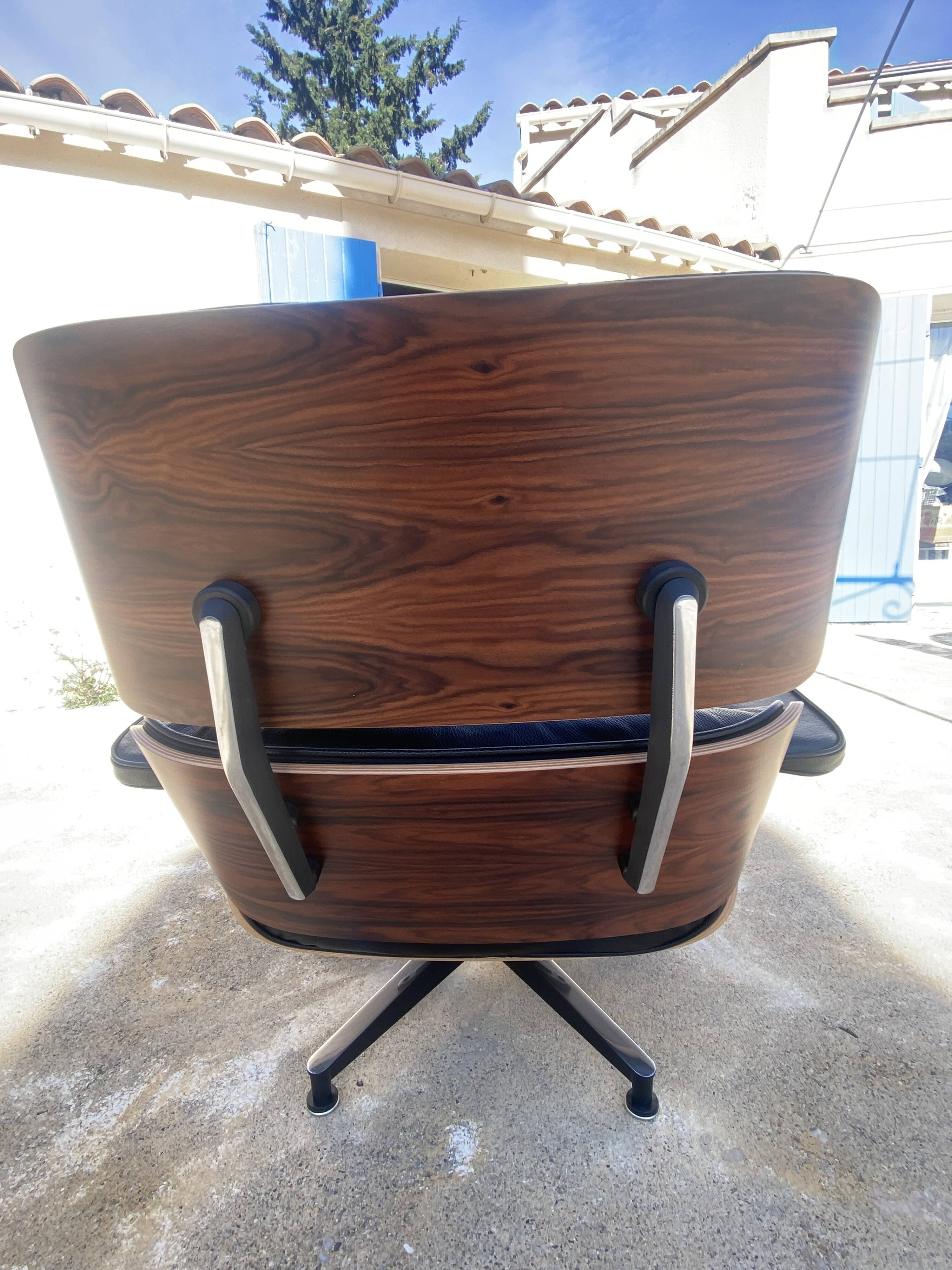 Fauteuil et Ottoman Charles Eames noir, Herman Miller, 2010