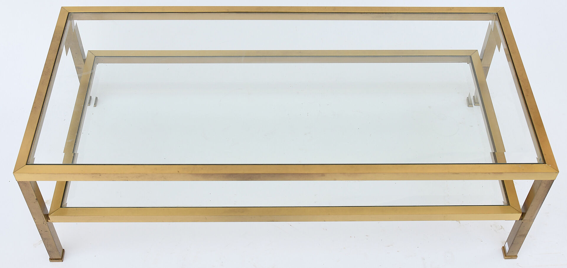 Coffee table in gilded brass and glass