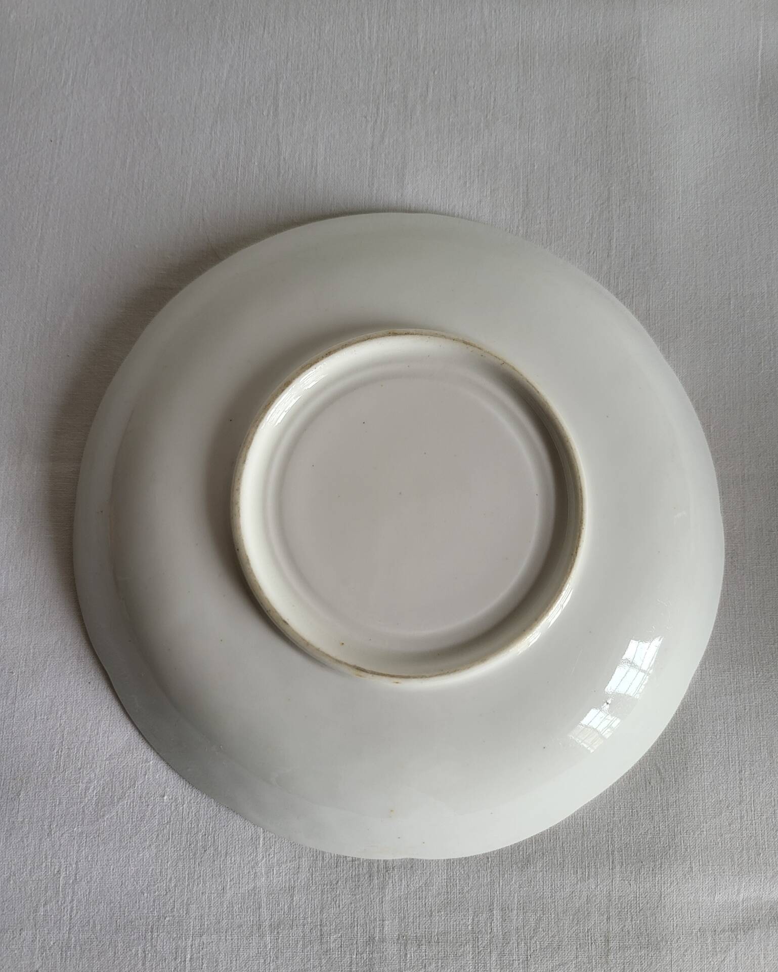 Antique Cup and Saucer in Porcelain with Hand-Painted Floral Decoration