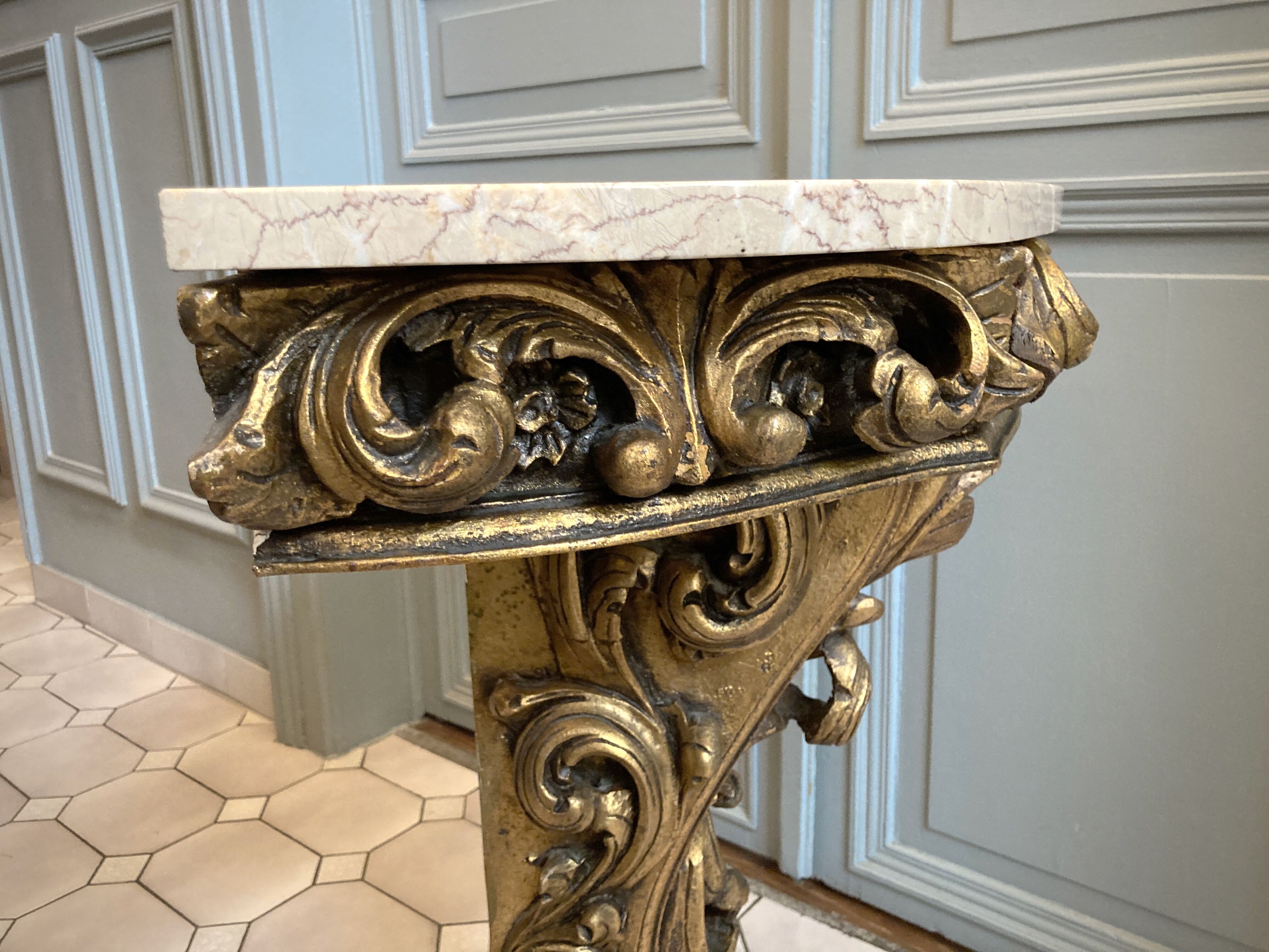 Carved wooden and marble console