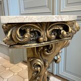 Carved wooden and marble console