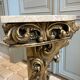 Carved wooden and marble console
