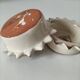 Duo of handmade beige and terracotta earthenware empty pockets