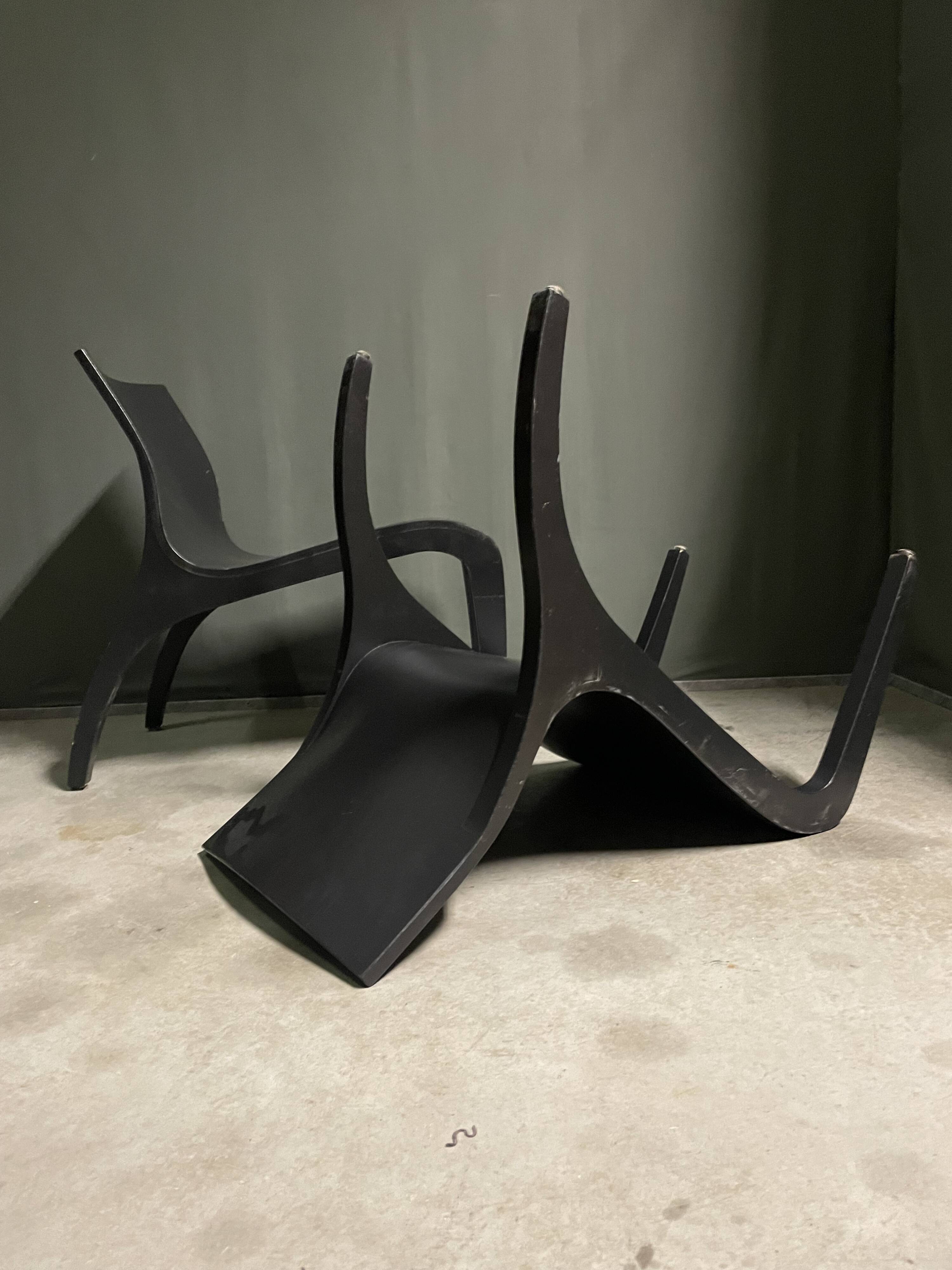 A pair Minimalist bent plywood lounge chairs