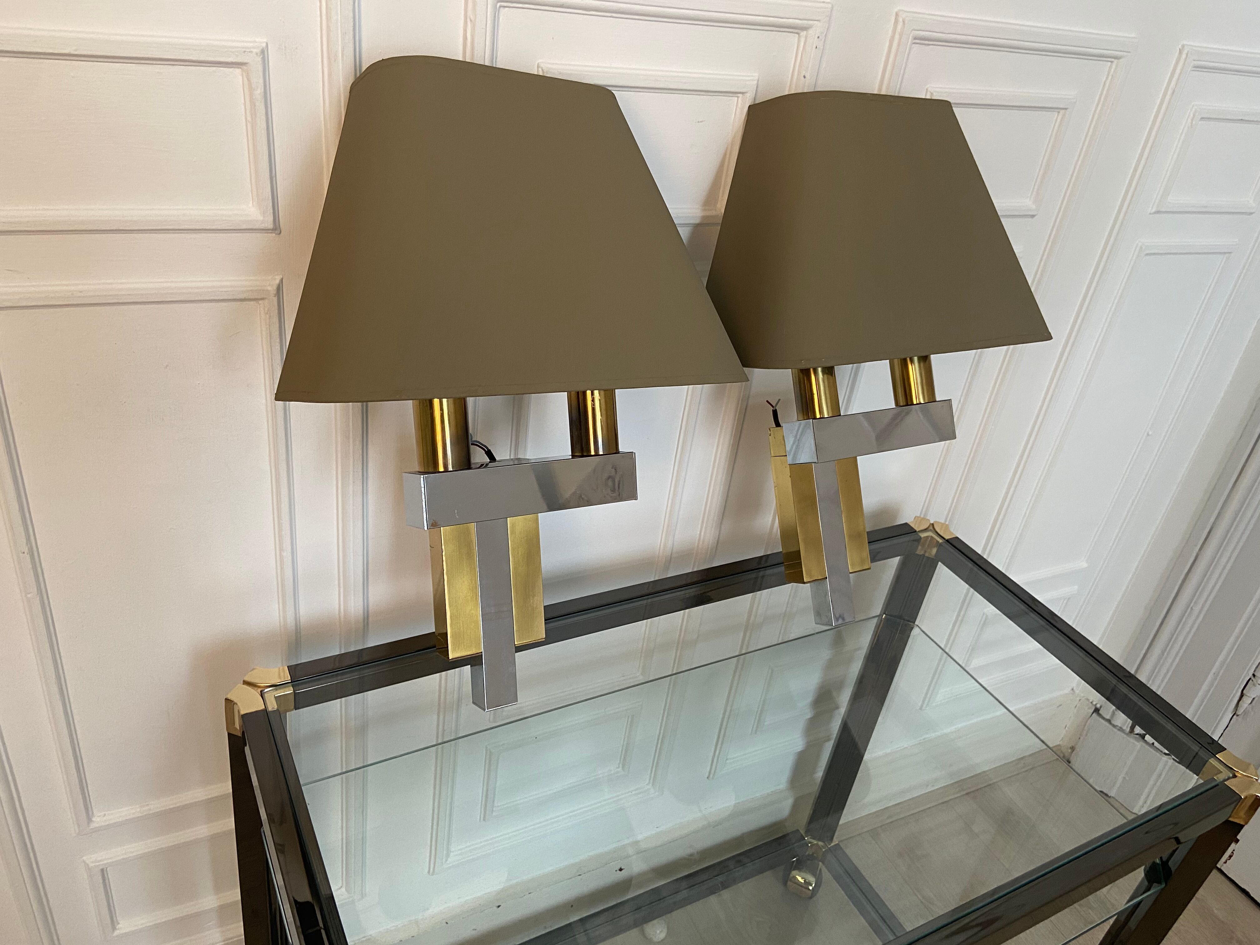 Pair of chrome and brass sconces, Italy, 1970s