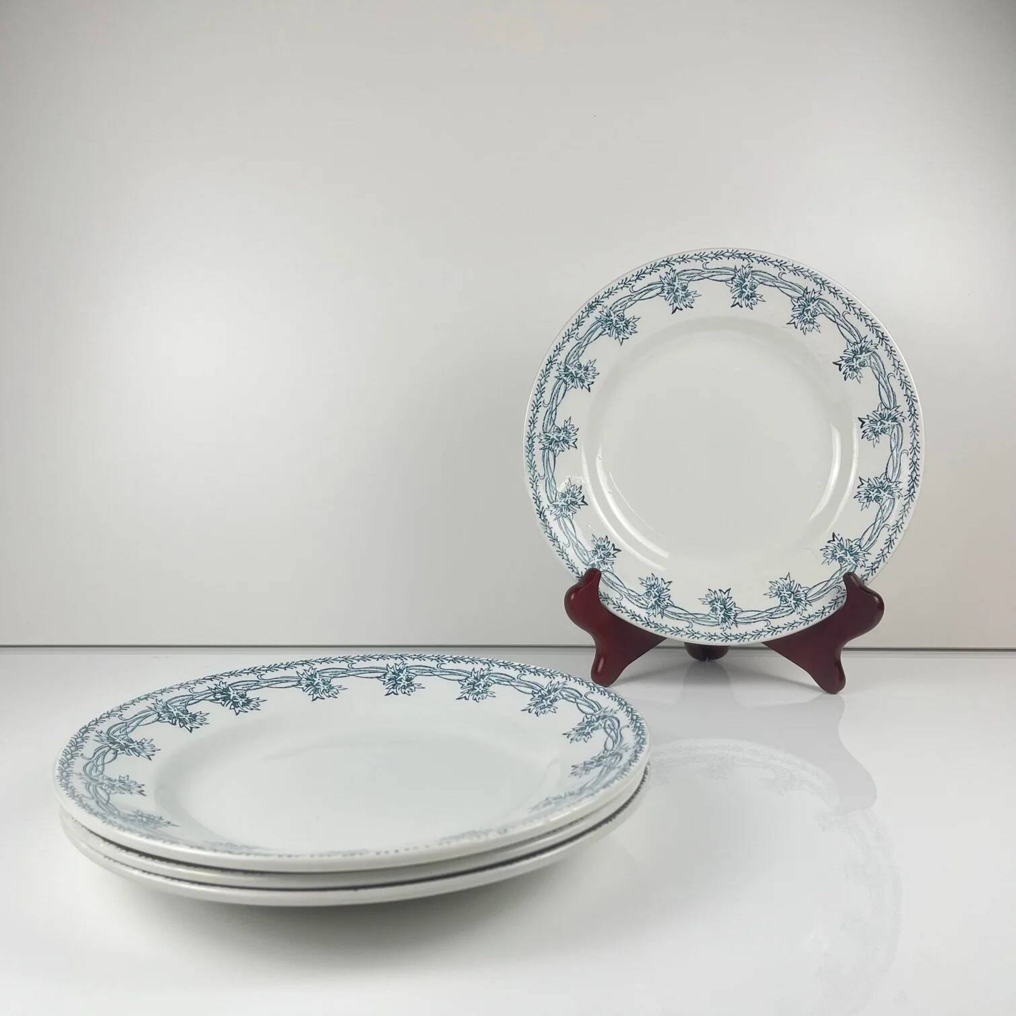 Set de 4 assiettes plates St Amand, vers 1930