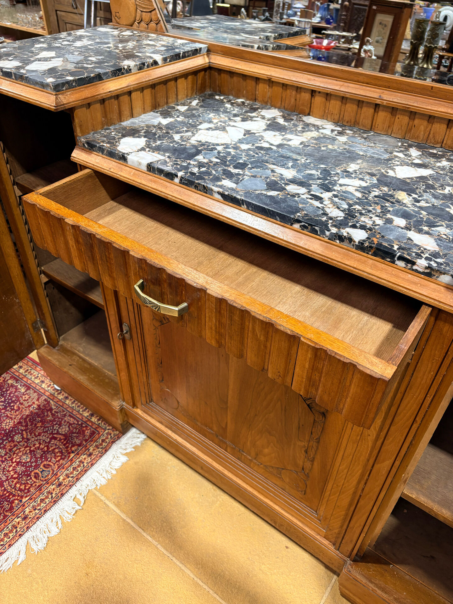 Art Deco buffet in carved walnut, marble and large mirror – 1930s