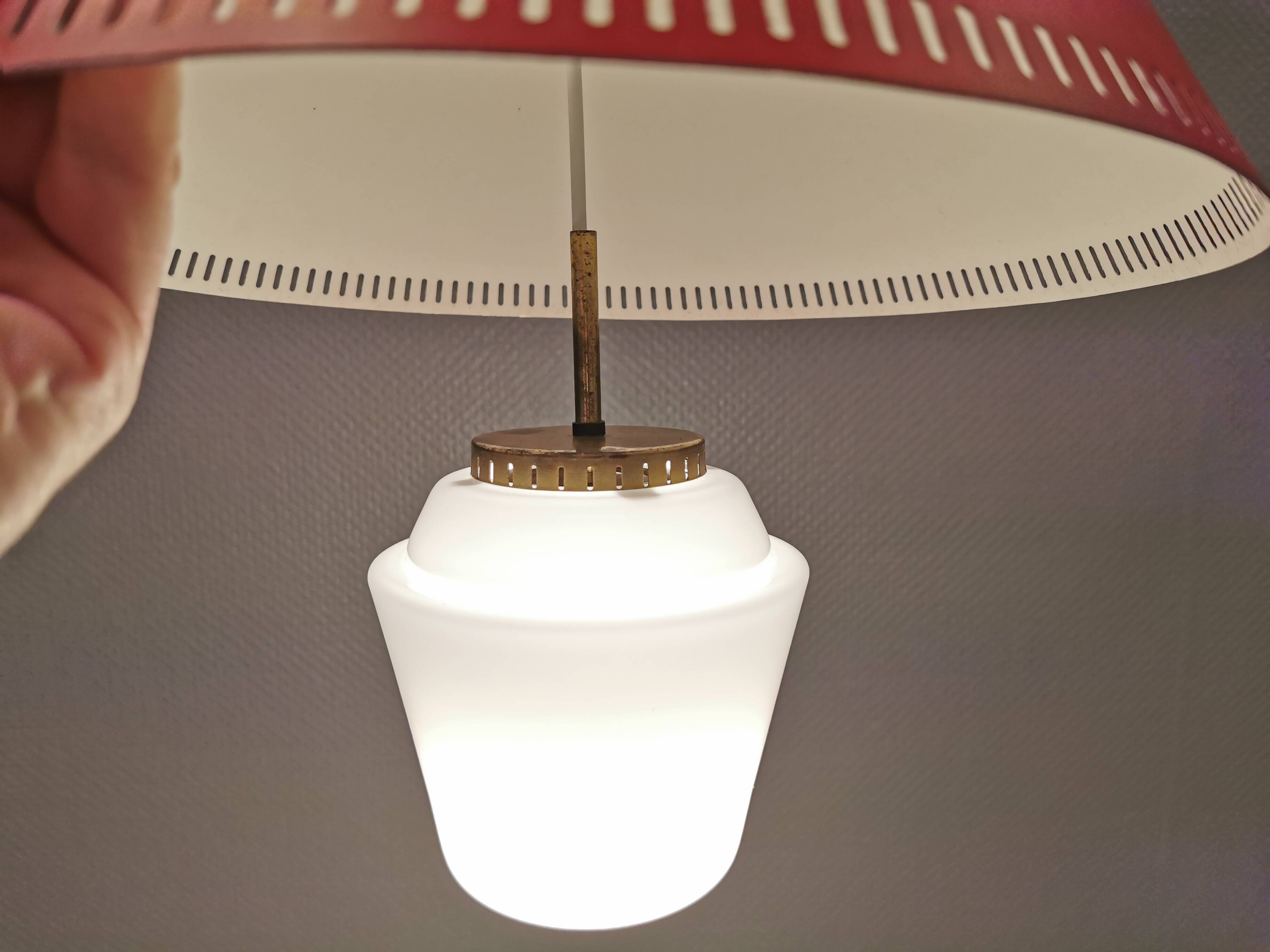 Hanging lamp in red lacquered metal and milky white opal glass 1970s Denmark.