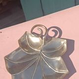 Gilded brass leaf pocket emptier