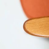 Fauteuil scandinave orange brûlée conclu par Chierowski