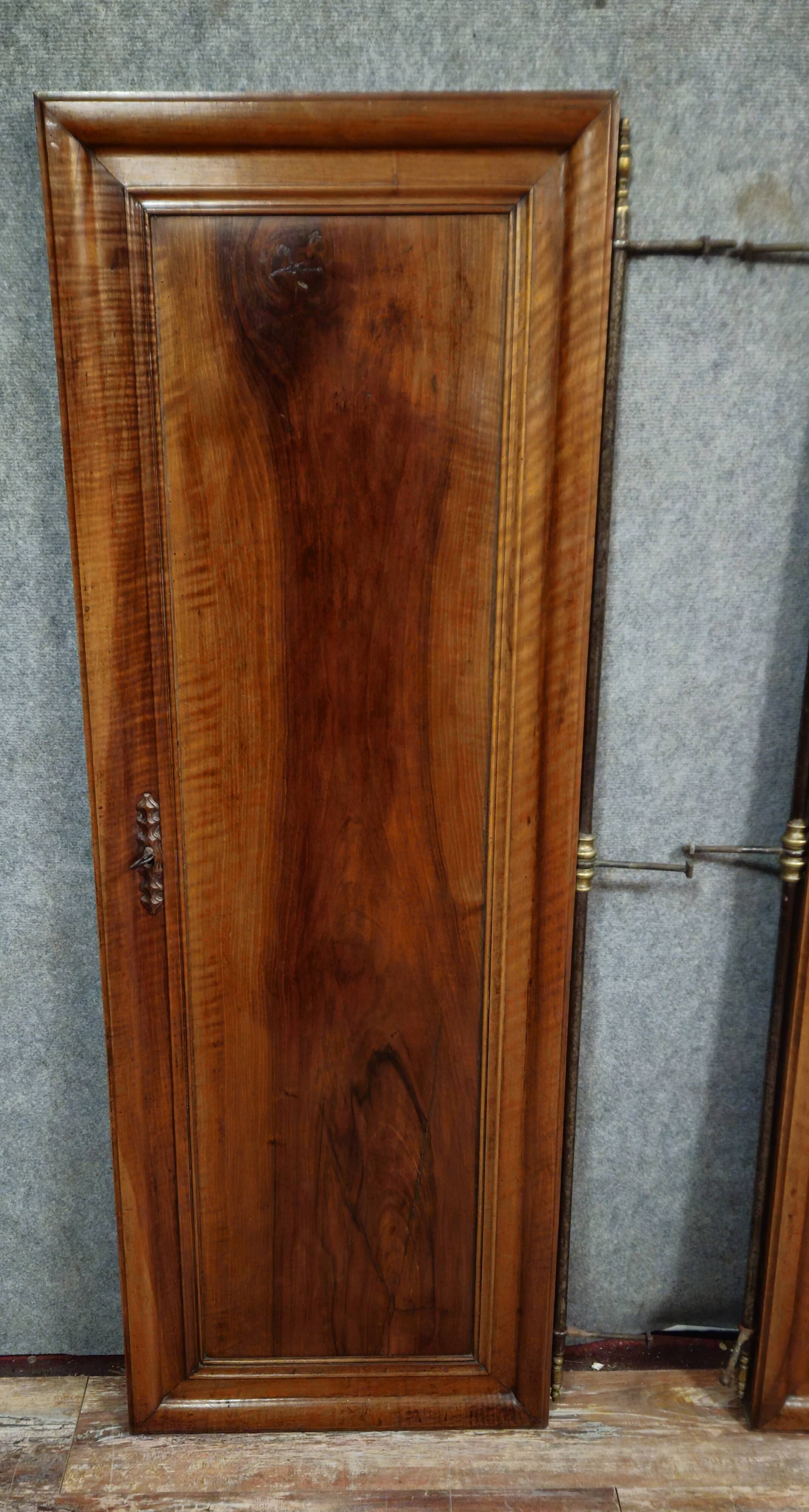 Pair of walnut wardrobe doors, dated 1895 / for cupboard