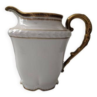 Old milk jug. Fine Limoges porcelain.
