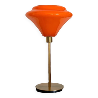 Lampe de table à poser avec un globe orange vintage en verre et un pied doré