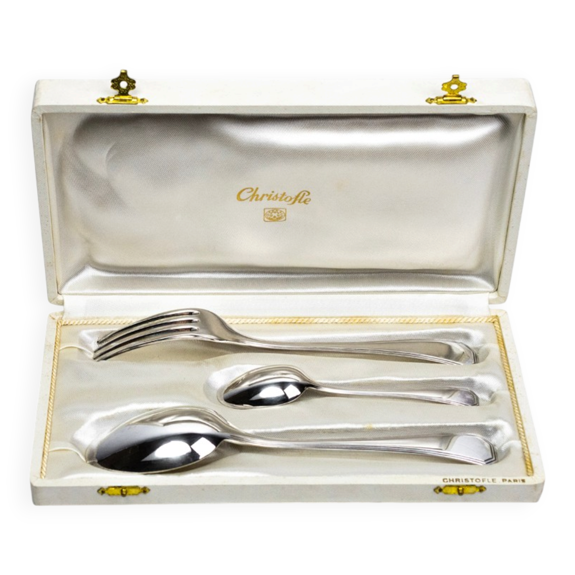 Three-piece birth set "America" — Christofle. 20th century.