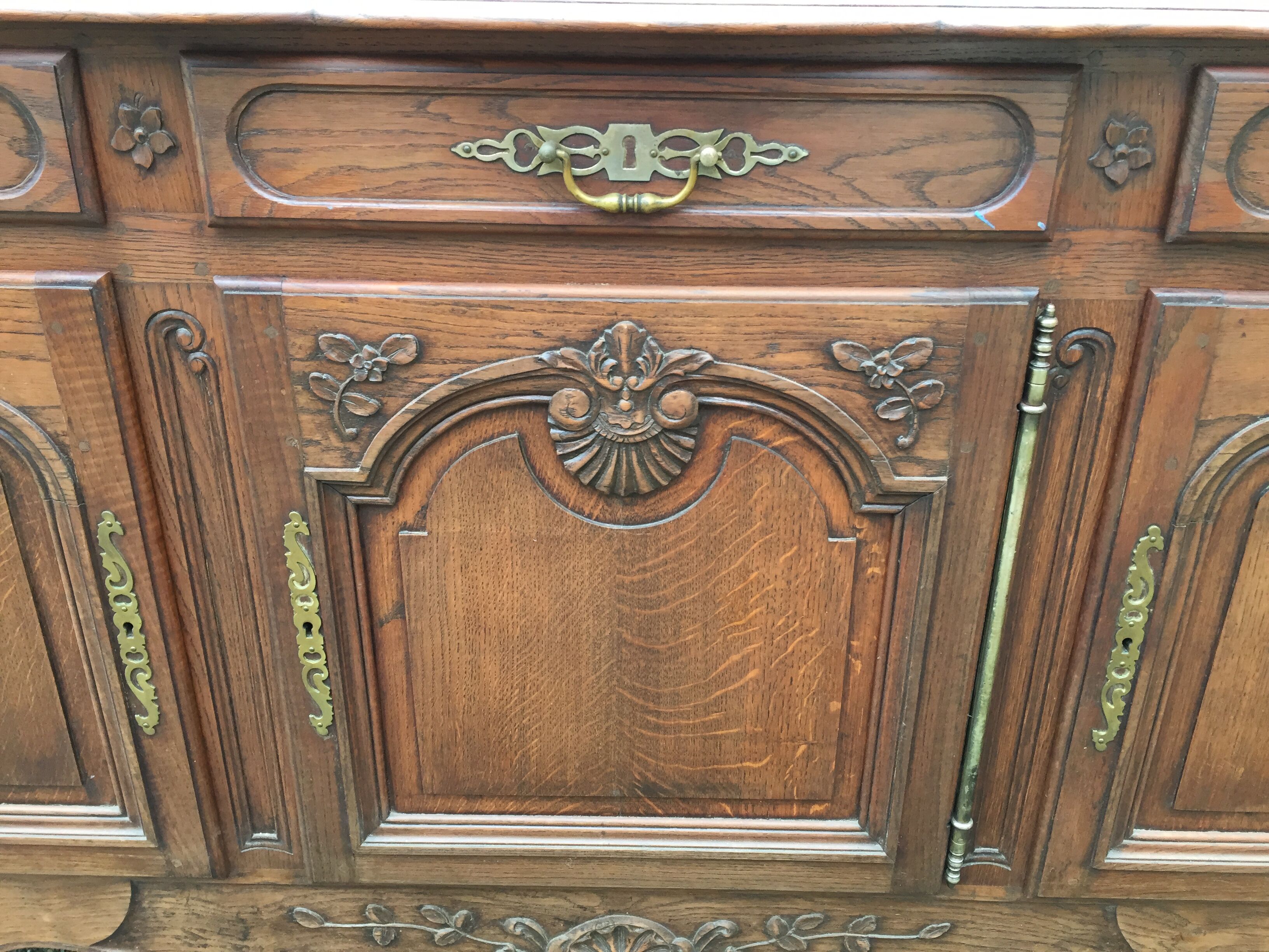 Louis XV sideboard in solid oak carved with 3 doors and 3 drawers
