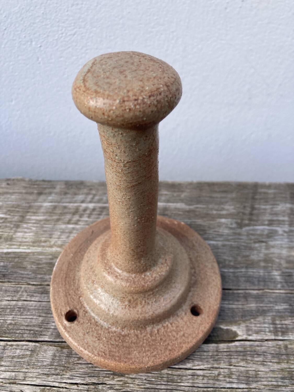 Coat hook sandstone wall light