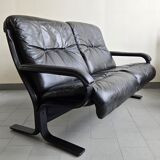 Scandinavian 2-seater sofa 1970s vintage in black leather and curved wood
