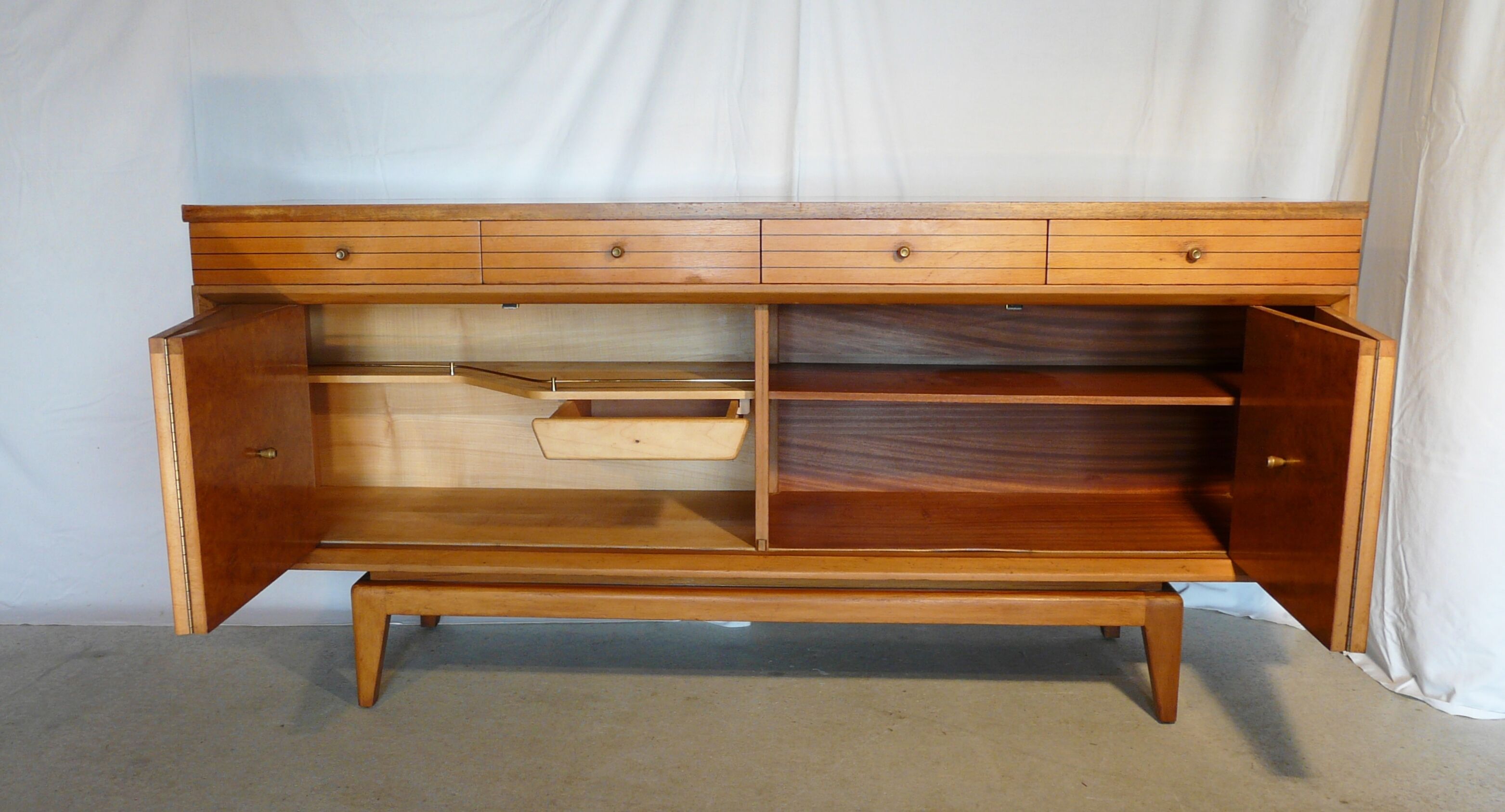 Scandinavian sideboard of blond wood and teak