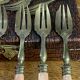 Dessert forks in brass and Bakelite in their case.
