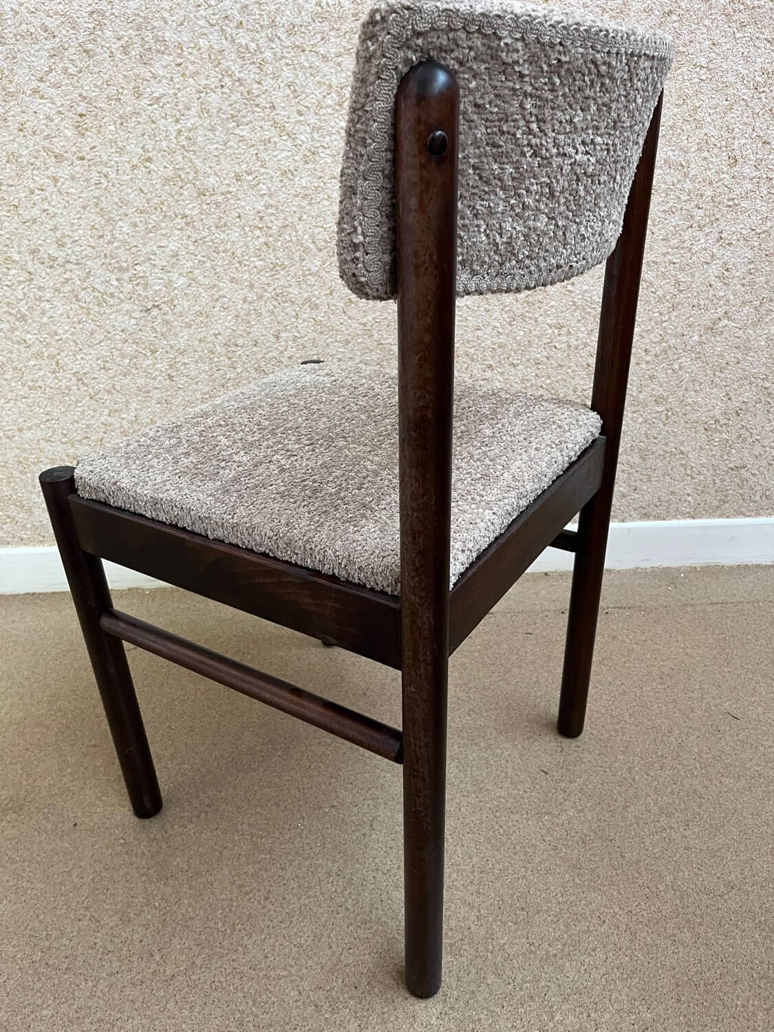 Pair of wooden chairs in loop fabric
