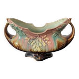 Old earthenware planter. Floral patterns.