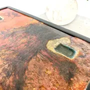 Coffee table by Robert and Jean Cloutier in enamelled lava and metal, 1950s.