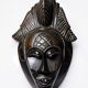 Decorative African wall mask in Punu Tsangui style, carved wood, 20th century.