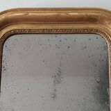 Old gilded mirror and old mercury glass - wall mirror with gold leaf