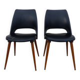 2 chaises en skaï noir pieds compas Louis Paolozzi