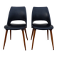 2 chairs in black skai compass legs Louis Paolozzi