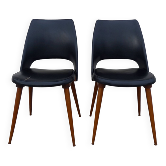 2 chairs in black skai compass legs Louis Paolozzi