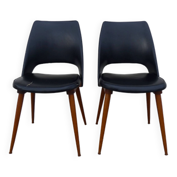 2 chairs in black skai compass legs Louis Paolozzi
