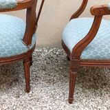 Paire de fauteuils médaillon style Louis XVI