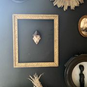 Wooden frame and gilded and carved stucco of the nineteenth century