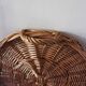 Medium round wicker plateau with two handles.