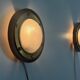 Pair of round glass wall lights, brass base and Wood Wood, 1960s, Italy.