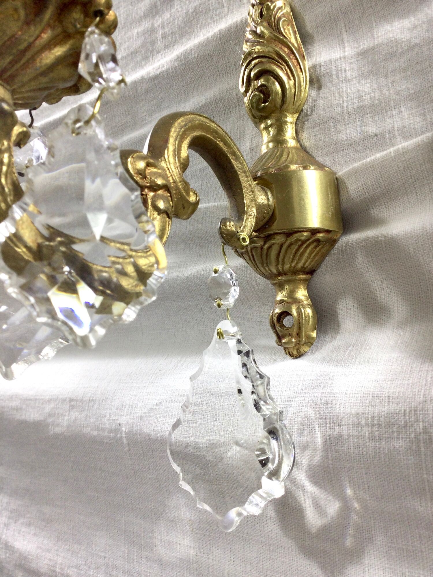 Pair of 1-light bronze sconces and Louis XV style stamps