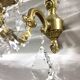 Pair of 1-light bronze sconces and Louis XV style stamps