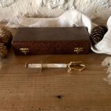 Sugar or ice tongs in their case