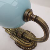 Art deco wall lamp in brass and soft blue opaline globe