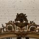 Louis XVI style mirror in wood and gilded stucco XIX century