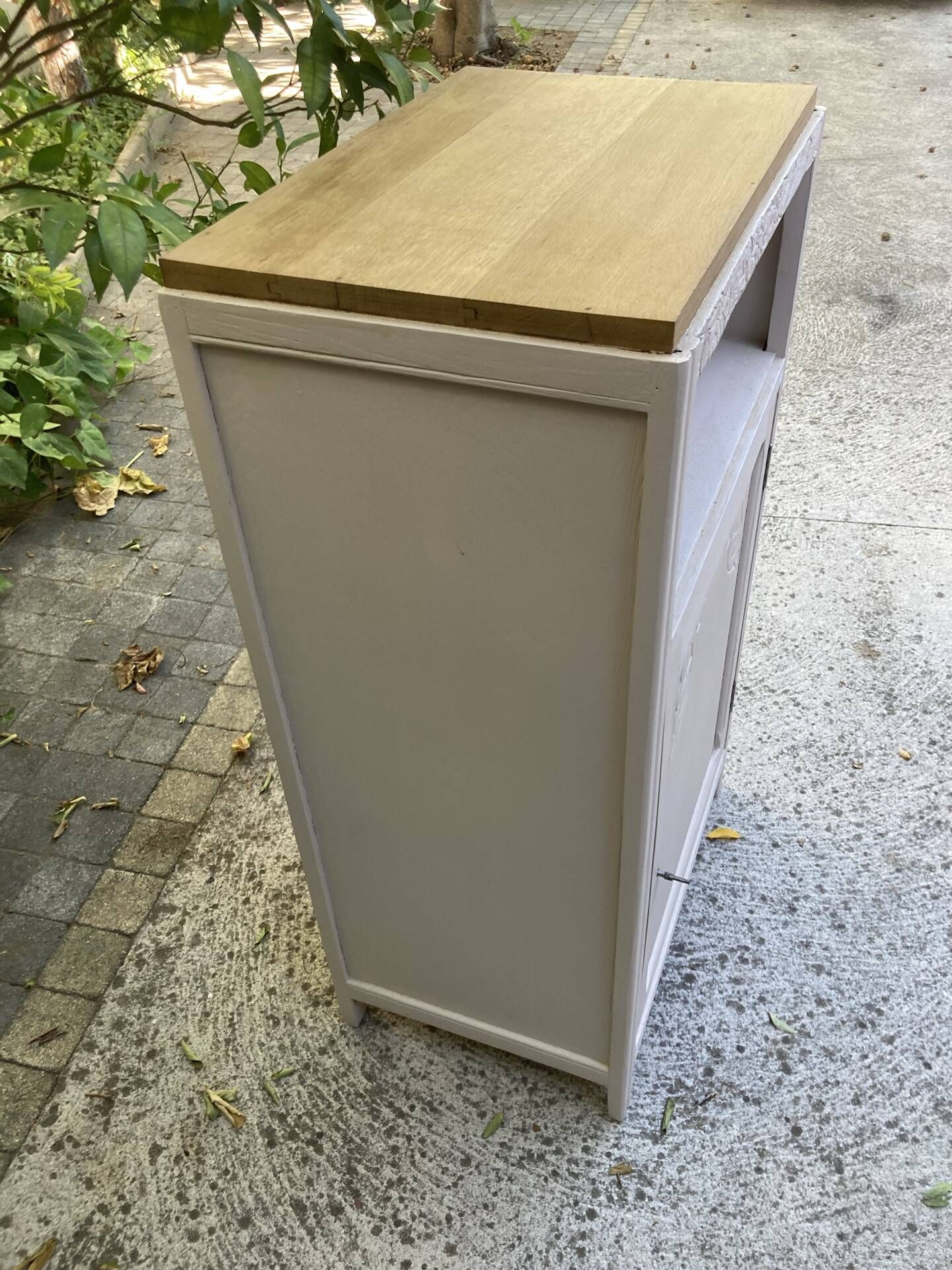Beautiful art deco jam cupboard in delicate beige tone / and wicker basket