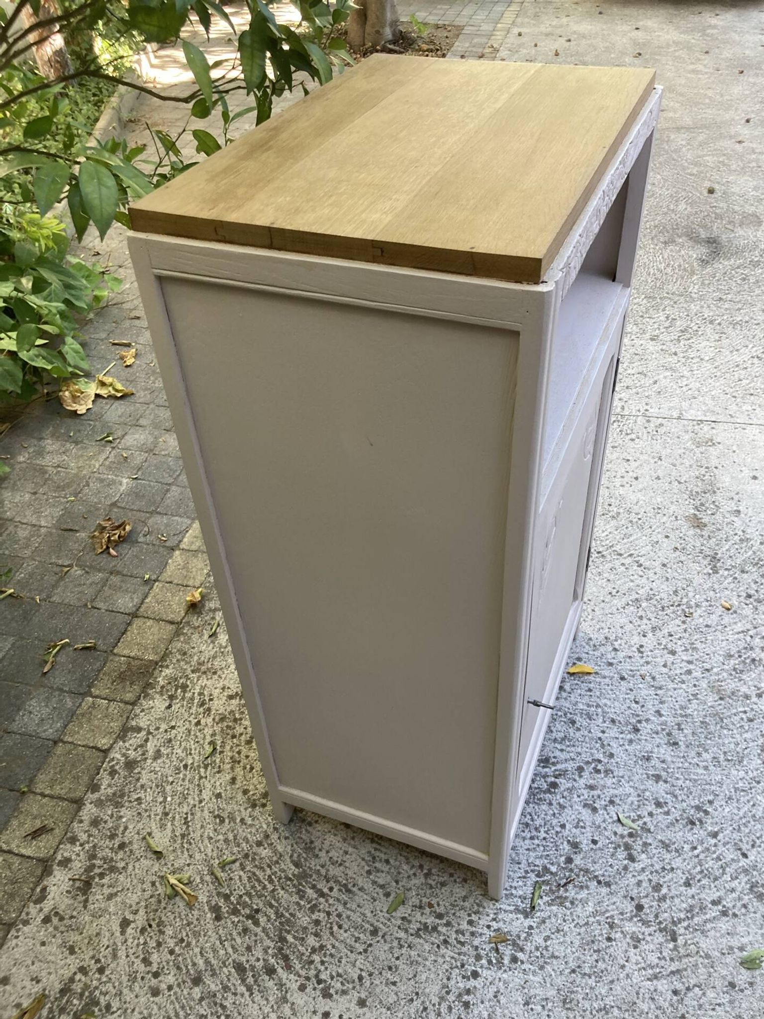 Beautiful art deco jam cupboard in delicate beige tone / and wicker basket