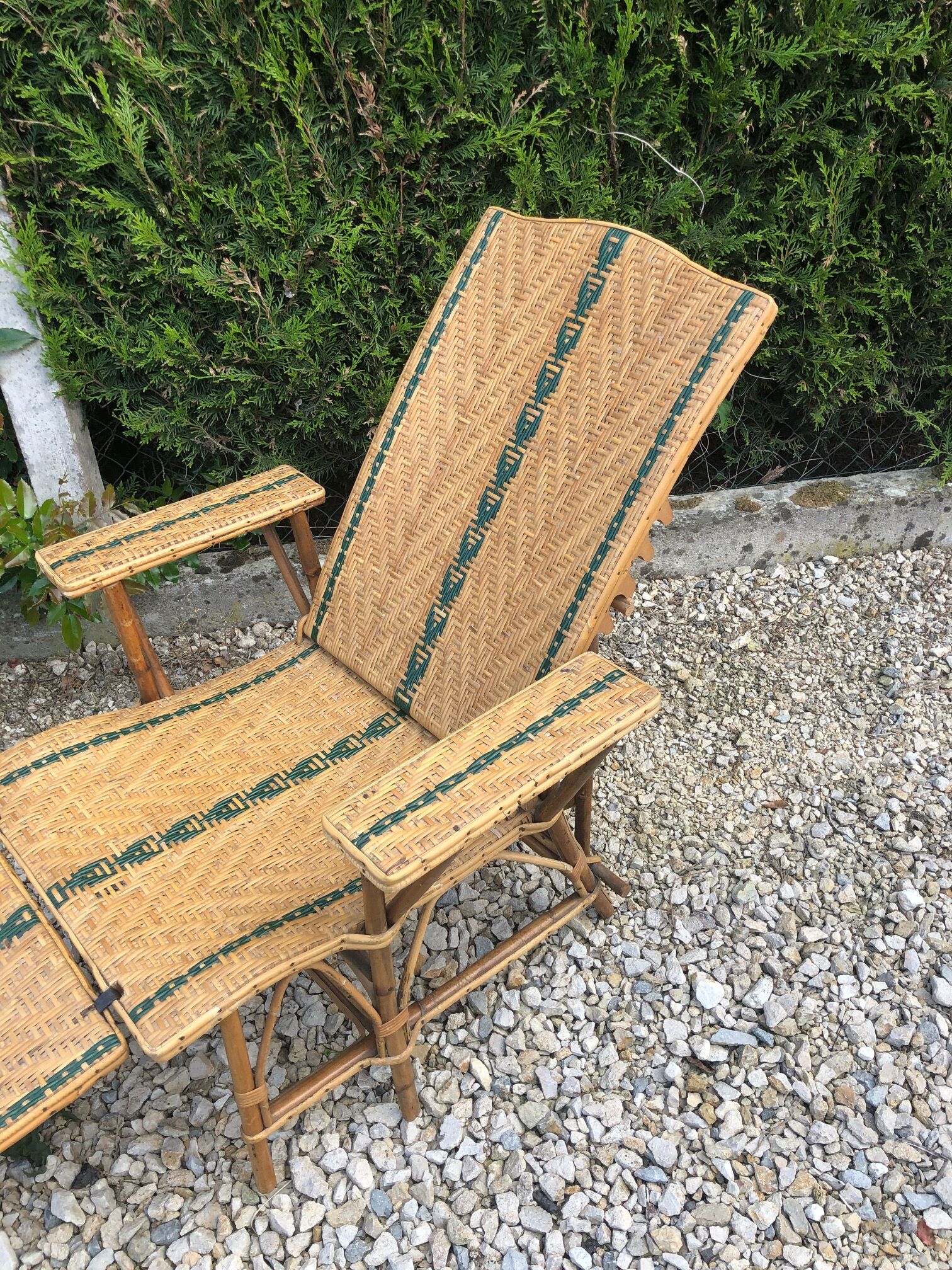 Rattan lounger with foot rest