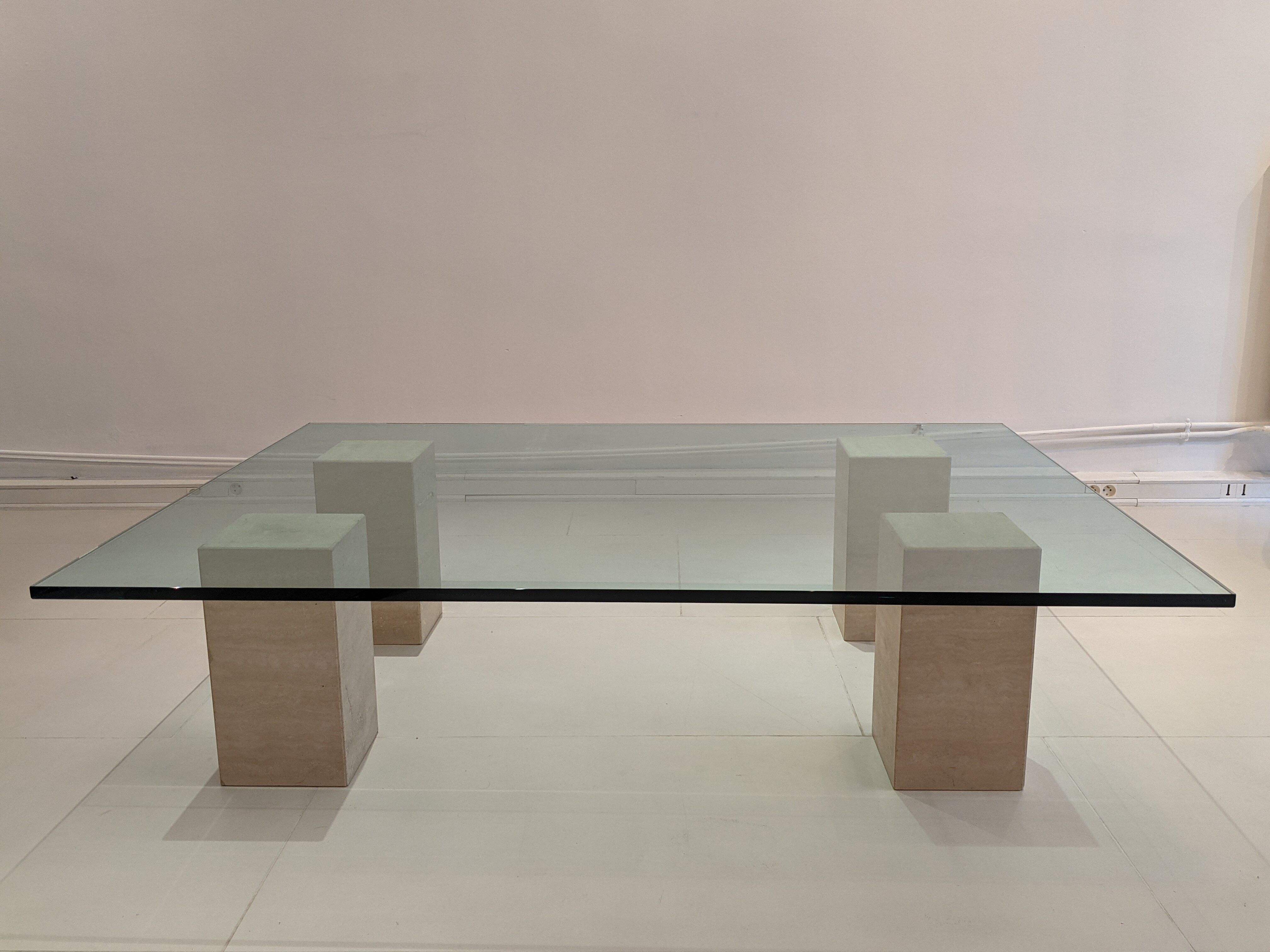 Glass table and travertine feet