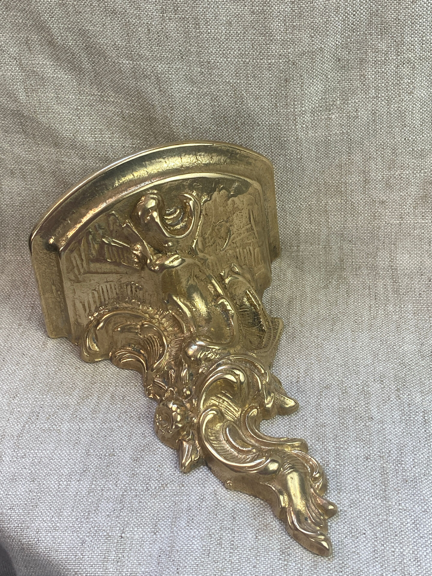 Small wall console in Rococo style in bronze