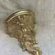 Small wall console in Rococo style in bronze