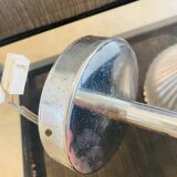 Many Kartell wall lamps.