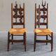 2 sculptural brutalist high-back chairs